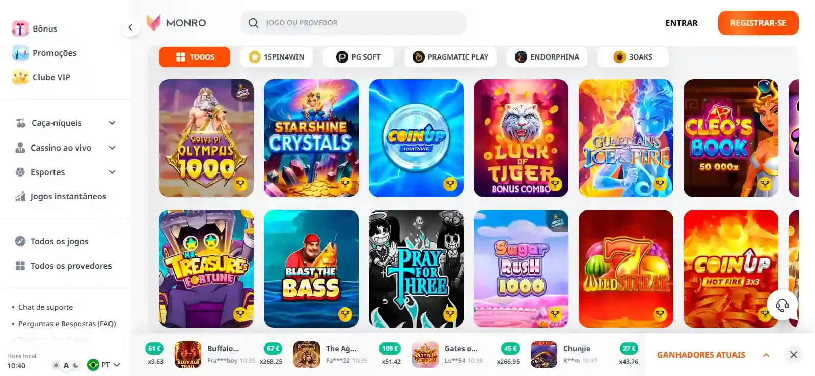 Ecrãs com uma grelha de slots e uma mesa de casino ao vivo num ambiente digital escuro
